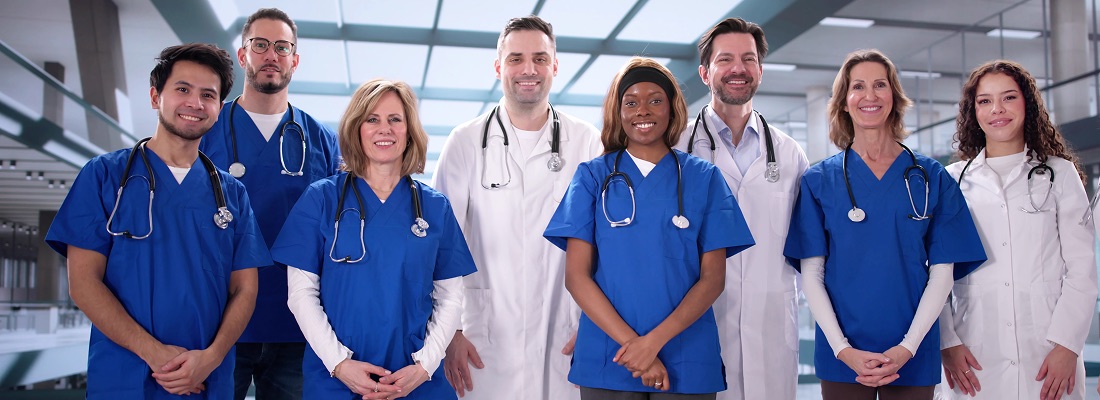 group of doctors and surgeons looking at camera and posing for photo after discussing clinical evidence for biohealx post market clinical study